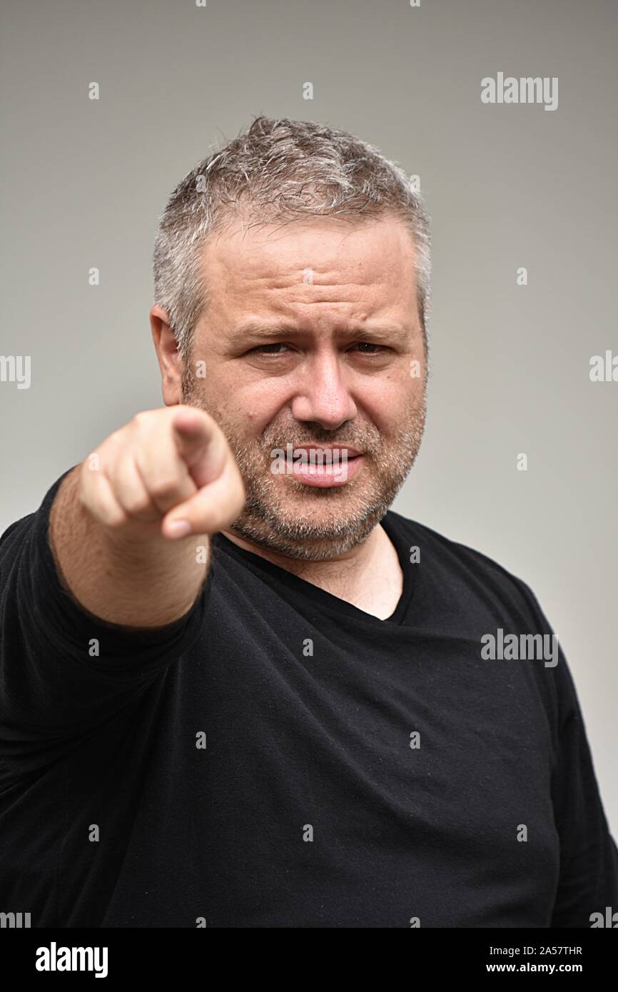 Caucasian Person Pointing Stock Photo