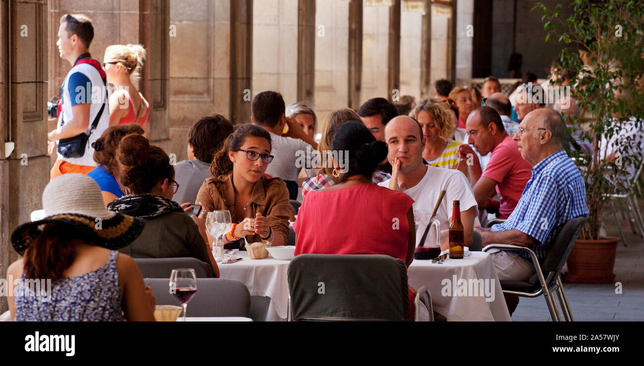 Tourists at a restaurant, Plaza Real, Barcelona, Catalonia, Spain Stock Photo