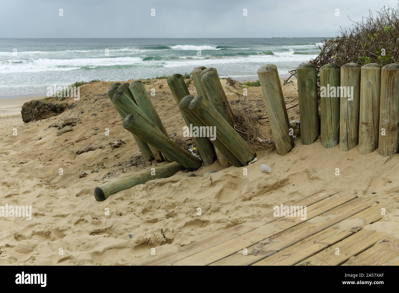 Durban Kwazulu Natal South Africa Landscape Objects Row Of Wooden Fence Poles Falling Down On Beach Coast Sea African Landscapes Stock Photo Alamy