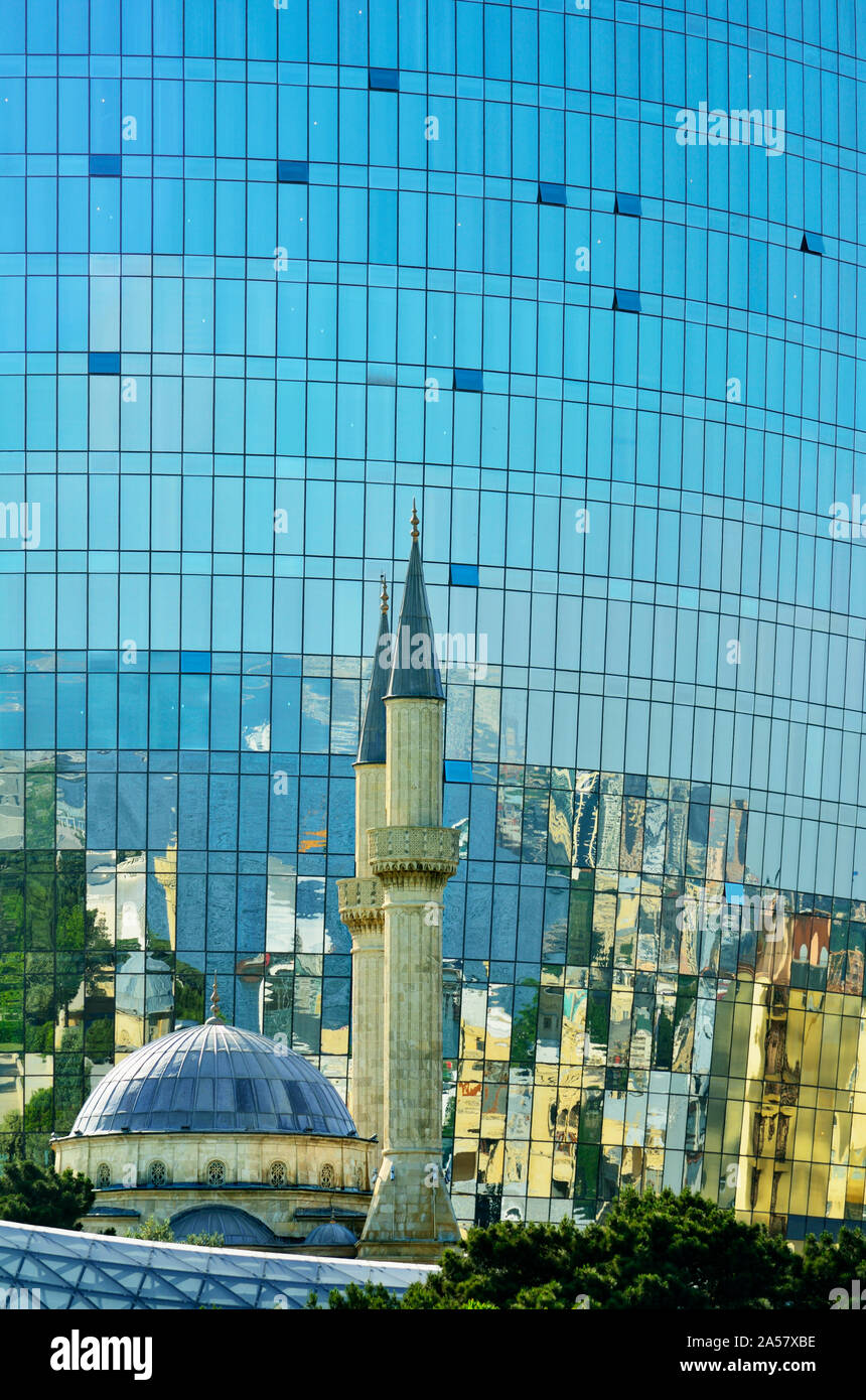 Sahidlar Xiyabani Mosque and the Flame Towers. Baku, Azerbaijan Stock Photo