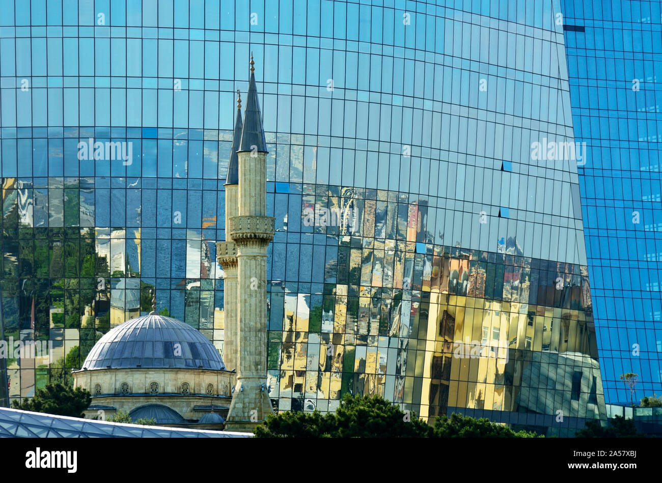 Sahidlar Xiyabani Mosque and the Flame Towers. Baku, Azerbaijan Stock Photo