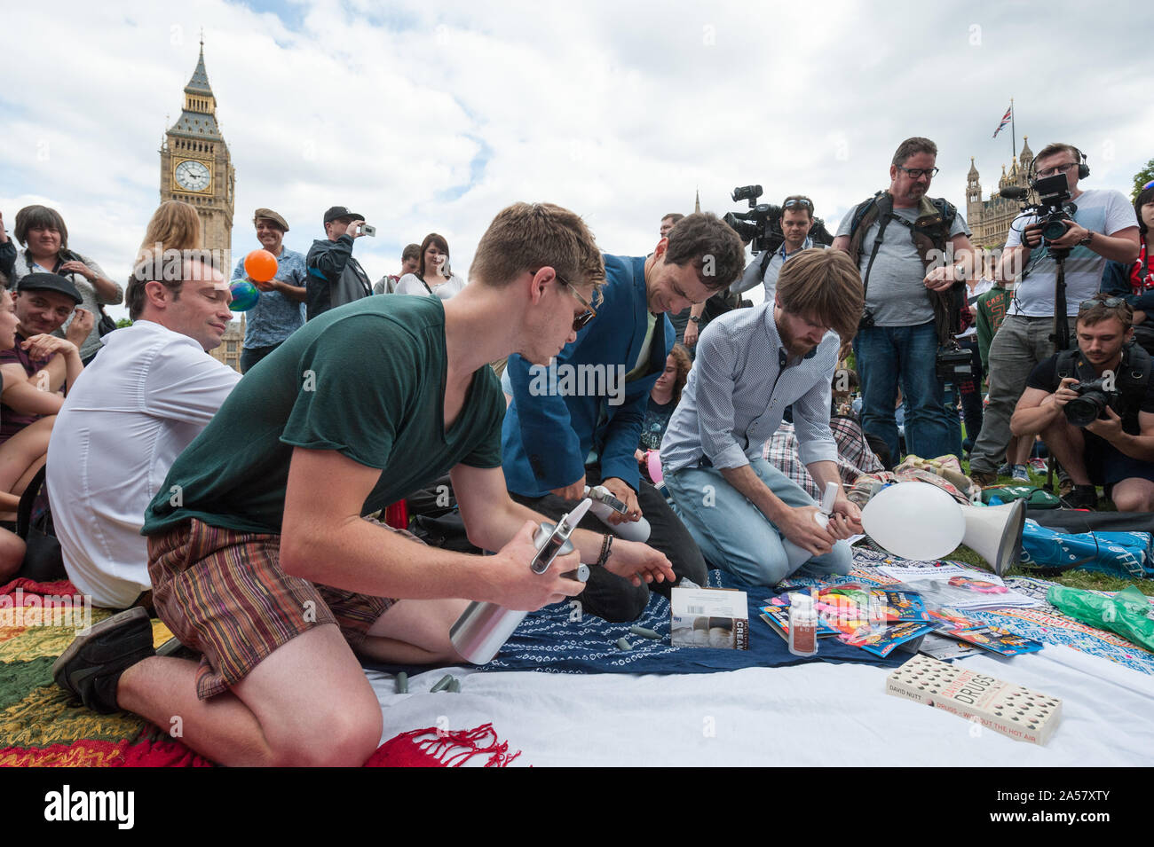 Parliament Square, London, UK. 1st August, 2015. About 50 pro psychoactive substance activists gather in Parliament Square in London to inhale nitrous Stock Photo