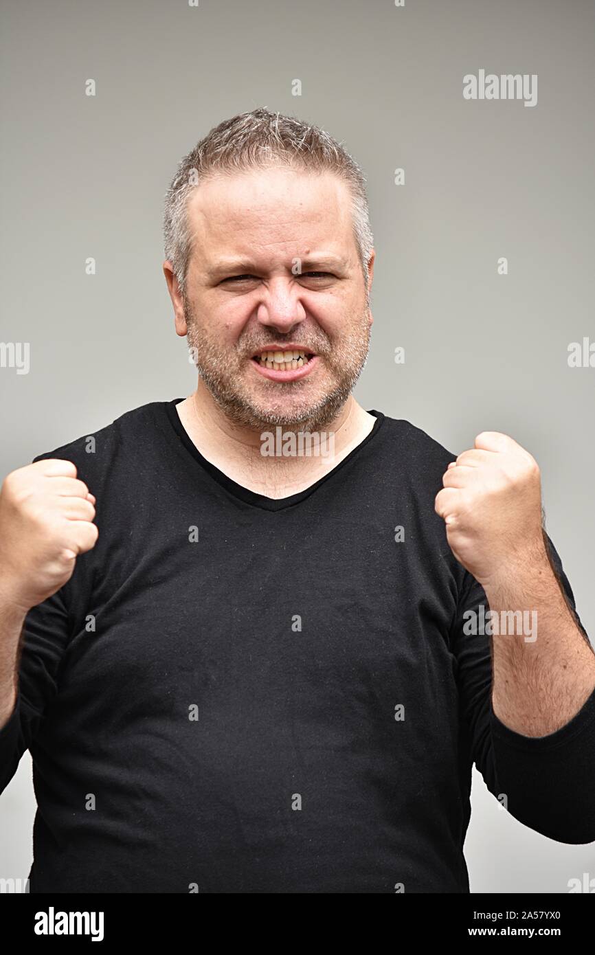 An Angry Overweight Male Man Stock Photo
