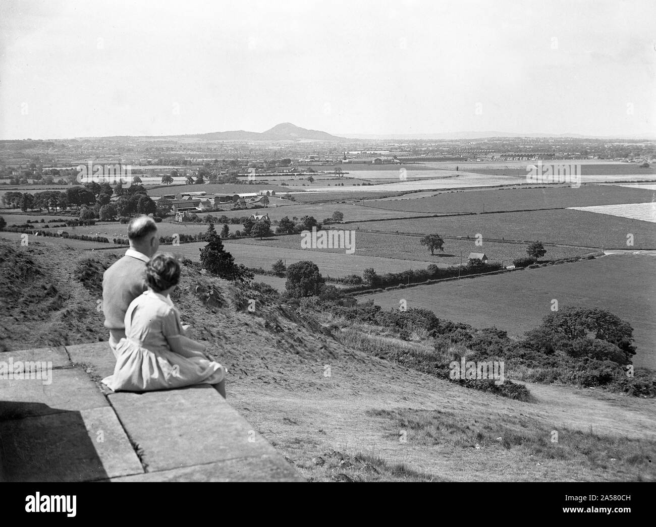 Couple admiring the view from Lilleshall Hill in Shropshire August 1953 Stock Photo