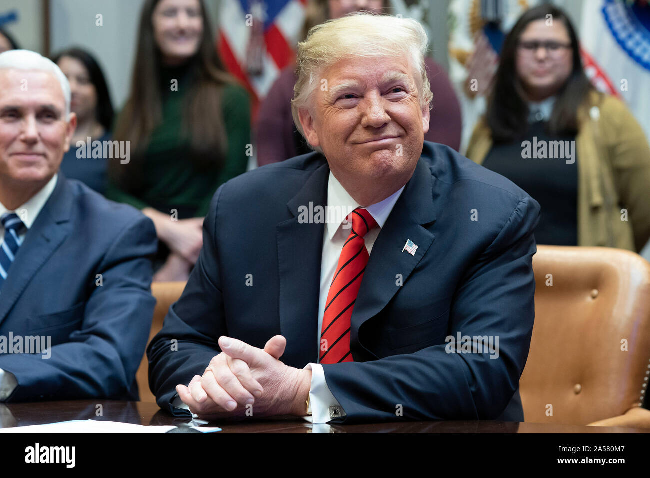 United States President Donald J. Trump congratulates NASA astronauts Jessica Meir and Christina Koch from the White House in Washington, DC after they conducted the first all-female spacewalk outside of the International Space Station on Friday, October 18, 2019.  Credit: Chris Kleponis / Pool via CNP | usage worldwide Stock Photo