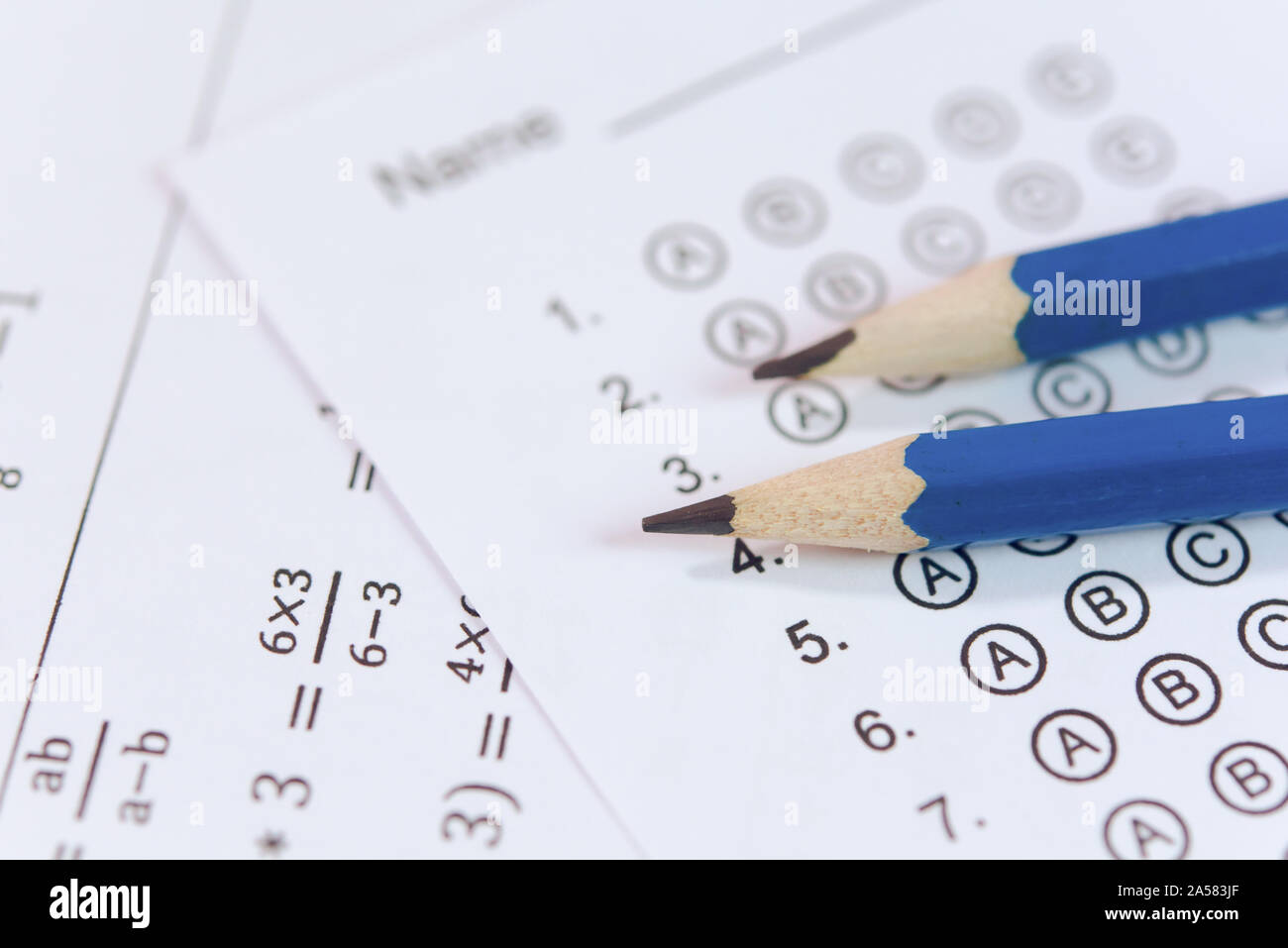 Pencil on answer sheets or Standardized test form with answers bubbled