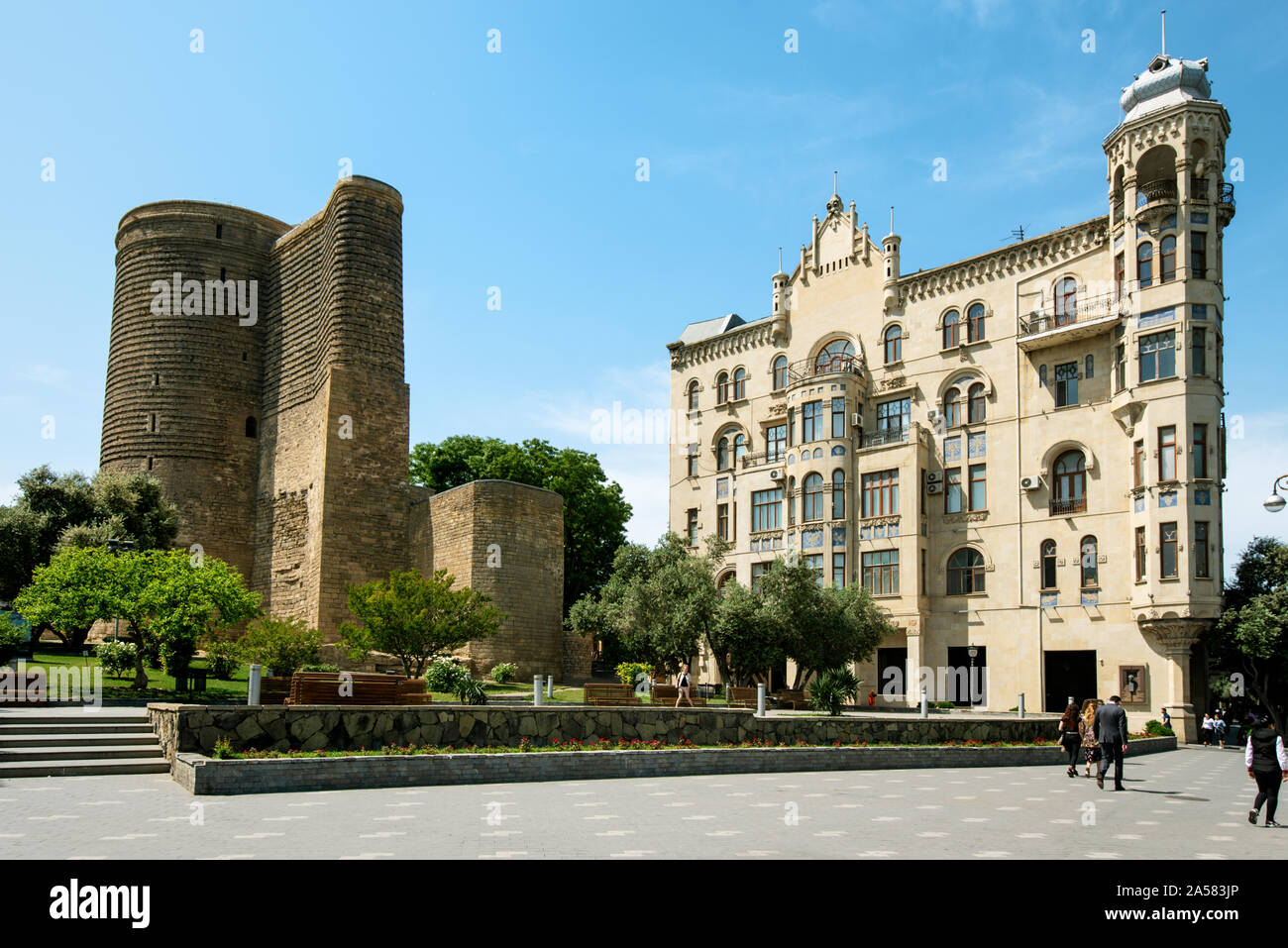 The Maiden Tower (Qiz Qalasi), a 12th century monument in the Old City, and a 19th century building. A UNESCO World Heritage Site. Baku, Azerbaijan Stock Photo