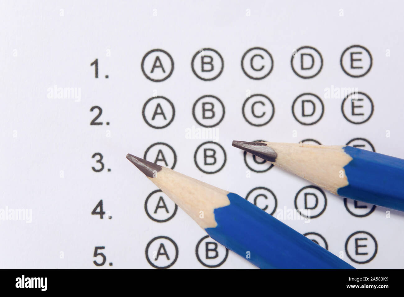 Pencil on answer sheets or Standardized test form with answers bubbled