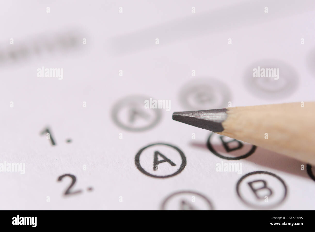 Pencil on answer sheets or Standardized test form with answers bubbled