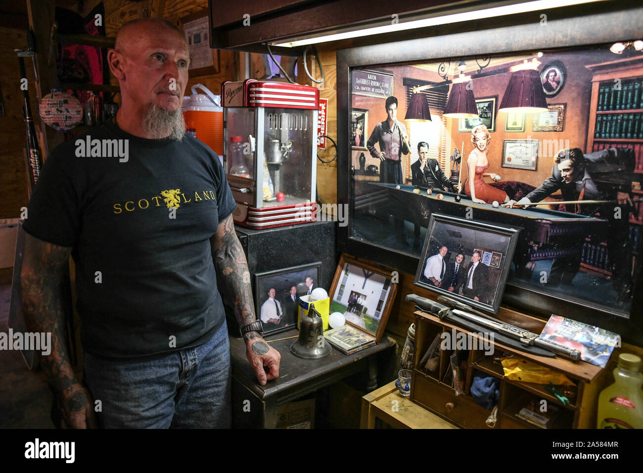 Dahlonega, Georgia, USA. 16th Sep, 2019. Doles in front of his collection of 'Americana,'' including white movie stars, a sword, and two identical photos of him with David Duke, whom Doles points to as evidence of his own mainstream American values. Credit: Miguel Juarez Lugo/ZUMA Wire/Alamy Live News Stock Photo