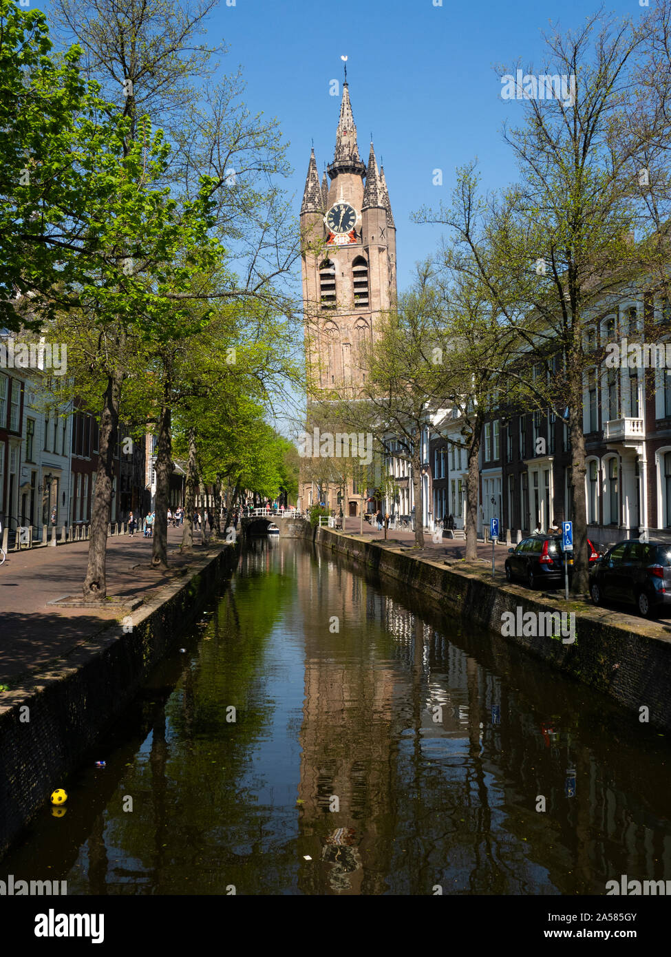 Old town with Oude Kerk church steeple rising above canal, Belft, South Holland, Netherlands Stock Photo