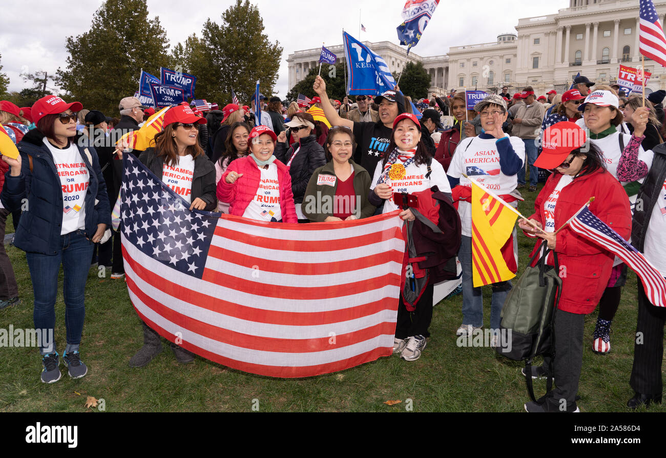 Washington, United States Of America. 17th Oct, 2019. Donald Trump supporters rallied outside Congress on Thursday for the "March for Trump,", an event meant to oppose House Democrats' impeachment investigation. Shouting "stop the coup", they marched down Pennsylvania Ave. and assembled on the U.S. Capitol West Lawn in Washington, DC on Thursday, October 17, 2019. (Photo by Jeff Malet) Photo via Credit: Newscom/Alamy Live News Stock Photo