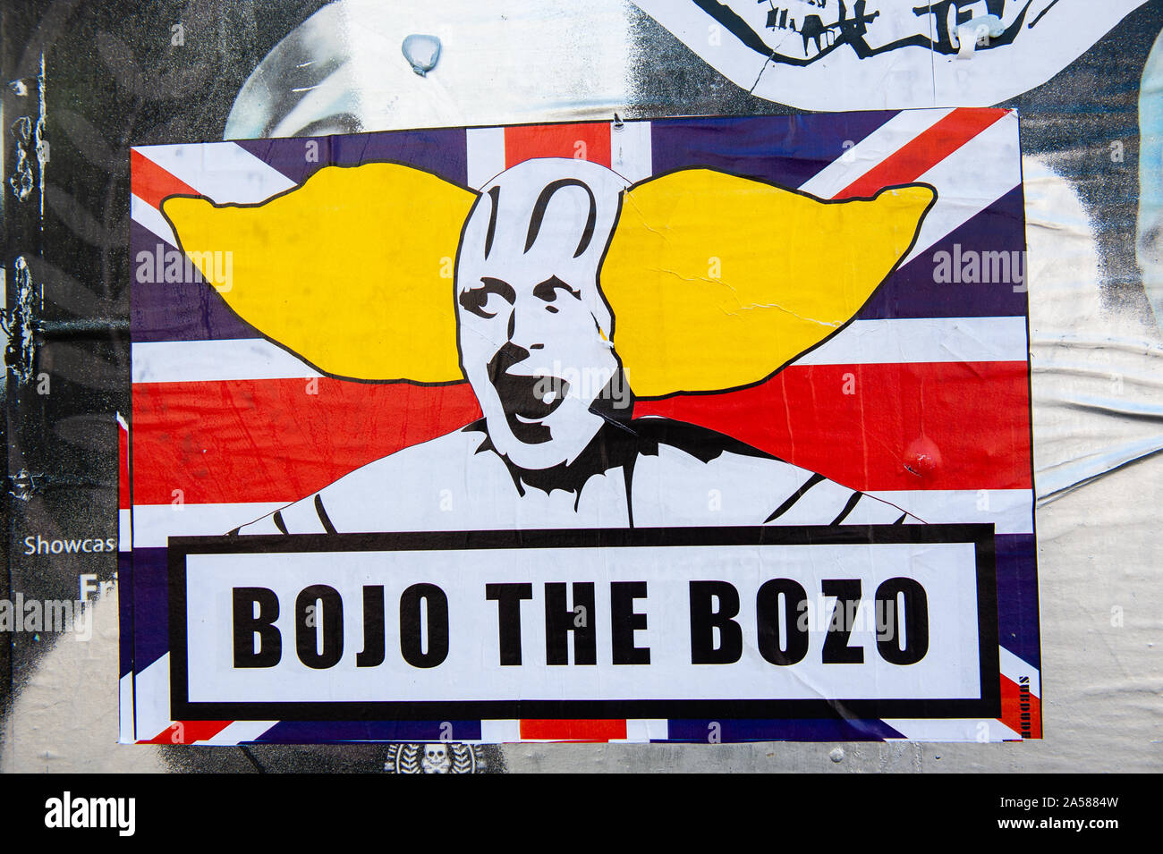 A paste up is seen showing Boris Johnson as a clown.As the Brexit deadline looms, new murals and paste-ups appear on the streets of London. Brick Lane, in London's east end, is one of the most popular places to find all kind of art around the Brexit. Also in the famous district of Shoreditch, tourists walk and take photos around this political street art. Stock Photo