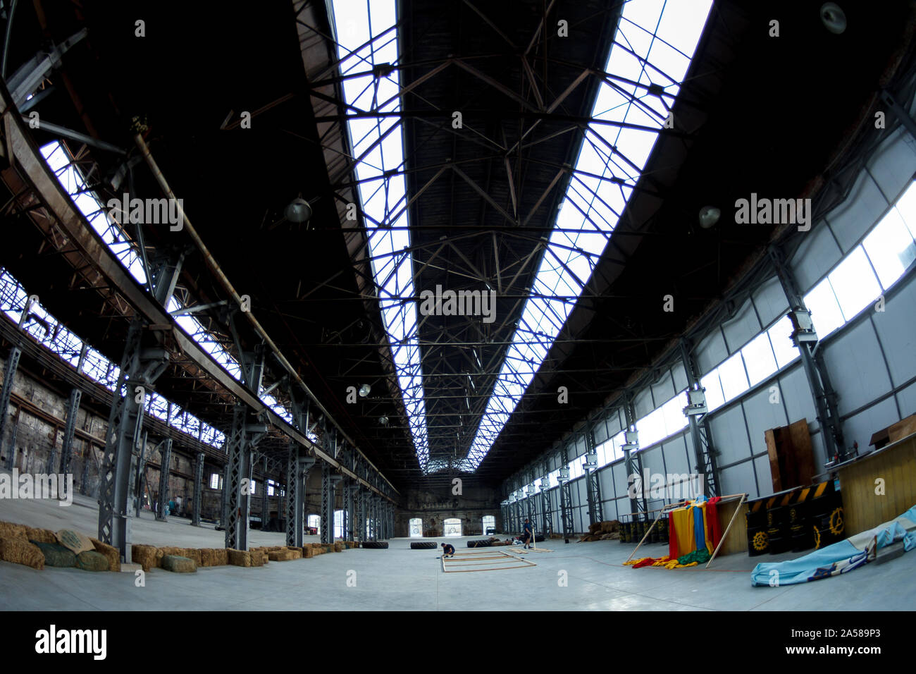 Empty factory building or warehouse building with concrete floor for industry background. Stock Photo