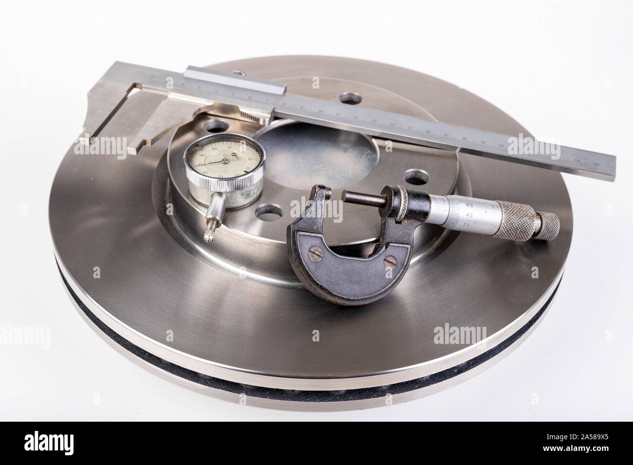 Brake discs and measuring instruments. Car parts measurements