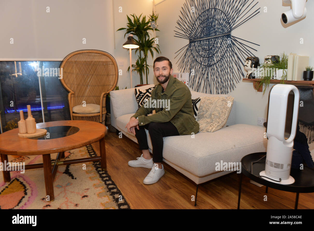 James Doran, 26, from Liverpool, who played as single mother 'Sammie',in his apartment at The Circle in Salford, Manchester, ahead of the live final of the second series of Channel 4's The Circle. Stock Photo