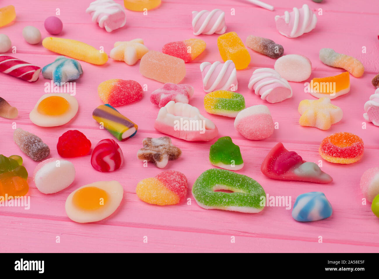 Gummy candies background Stock Photo - Alamy
