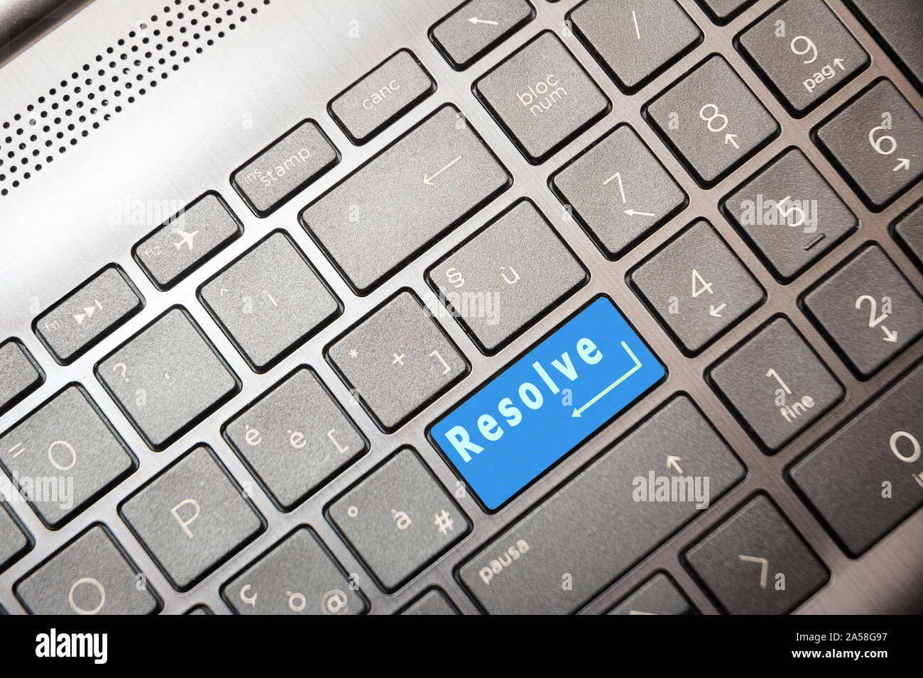 Blue button on the computer with the text Resolve Stock Photo