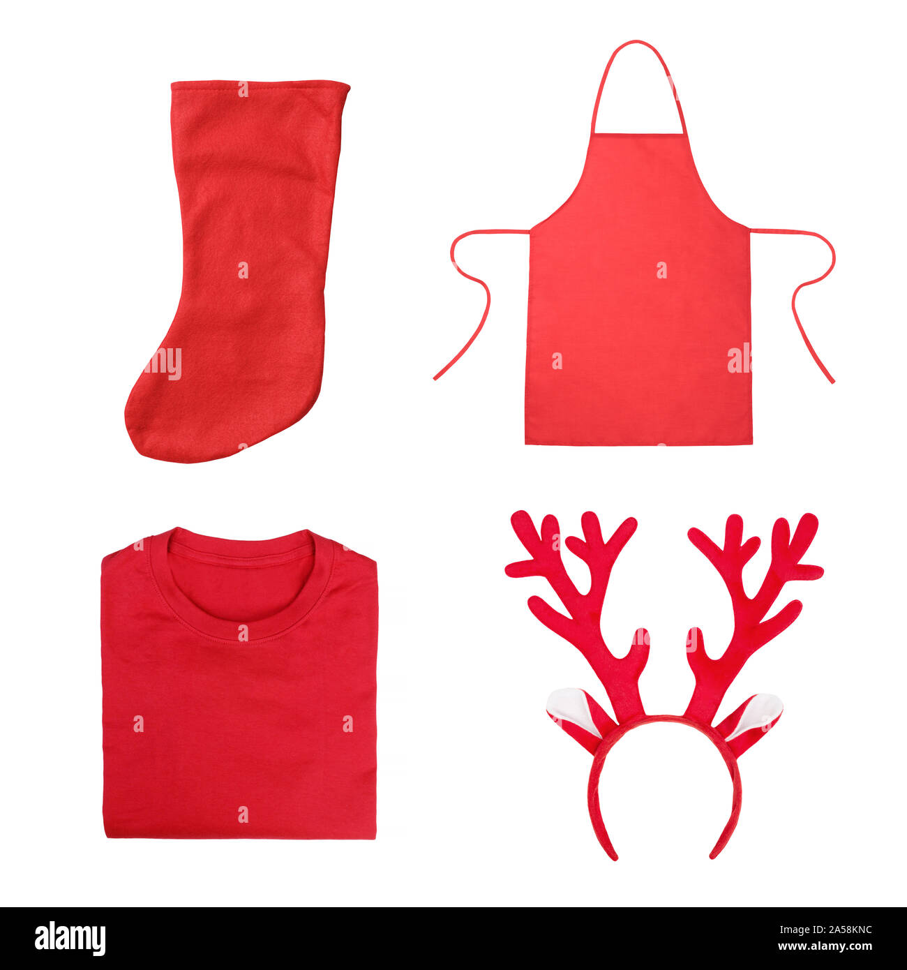 Christmas objects including antlers headband, red folded t-shirt, red apron, red Christmas sock isolated on white Stock Photo