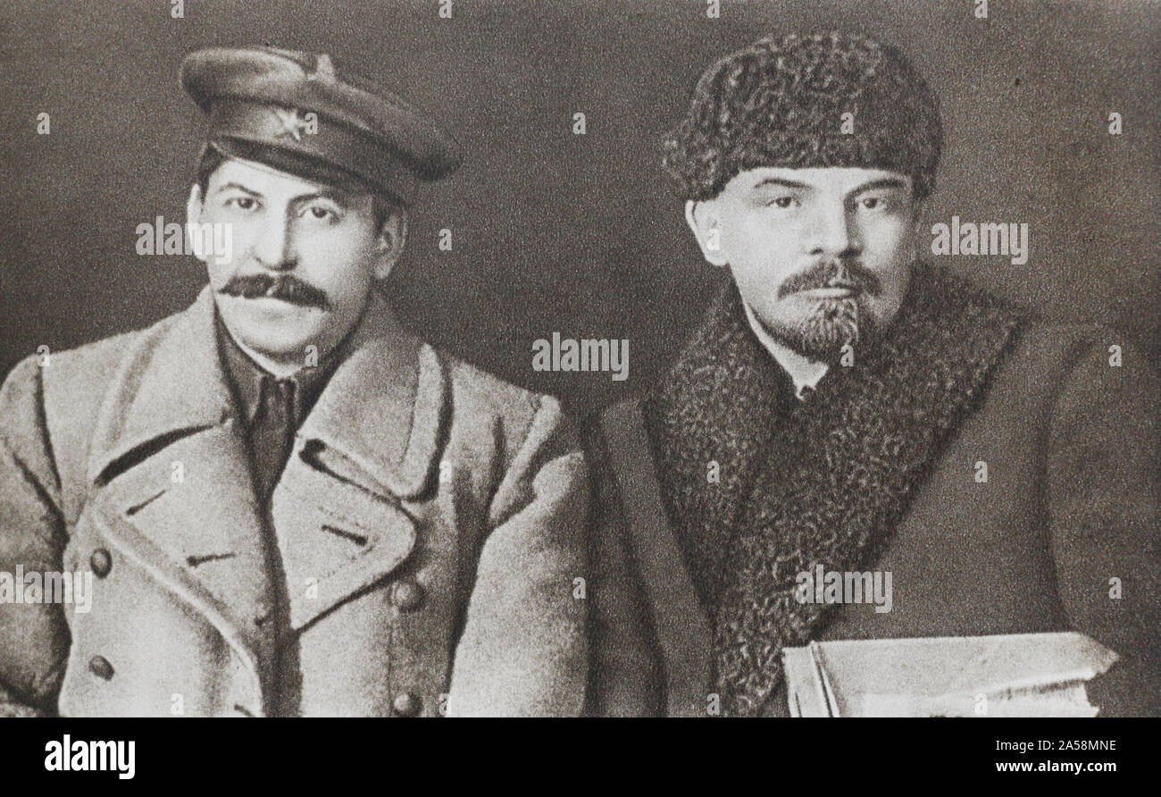 Photo portrait of Joseph Stalin and Vladimir Lenin. Stock Photo