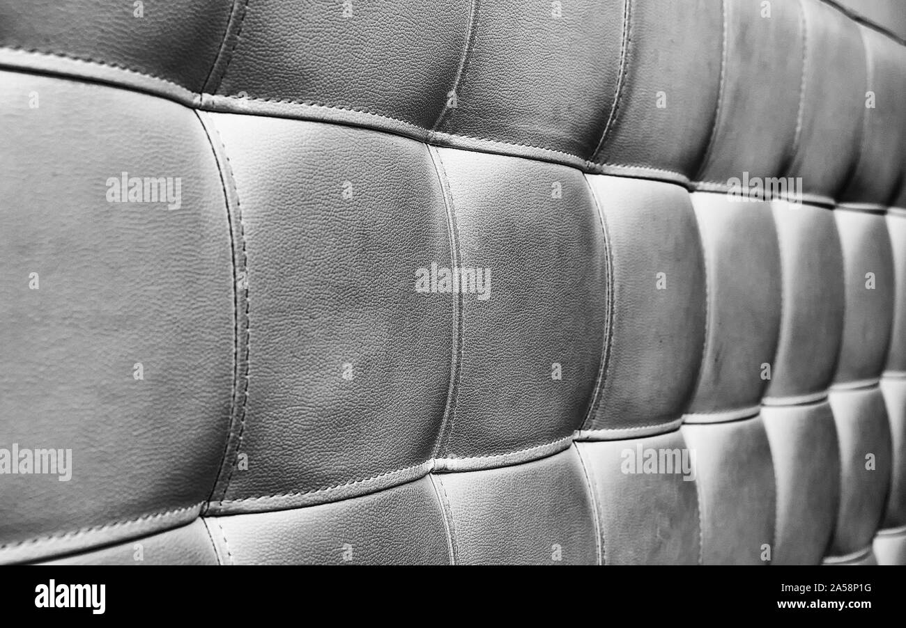 Tufted grey leather headboard texture, used for background Stock Photo