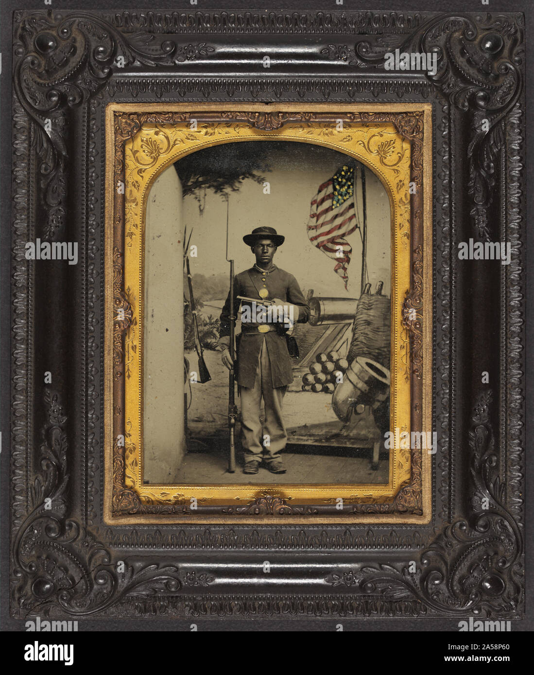 Unidentified African American soldier in Union uniform with a rifle and