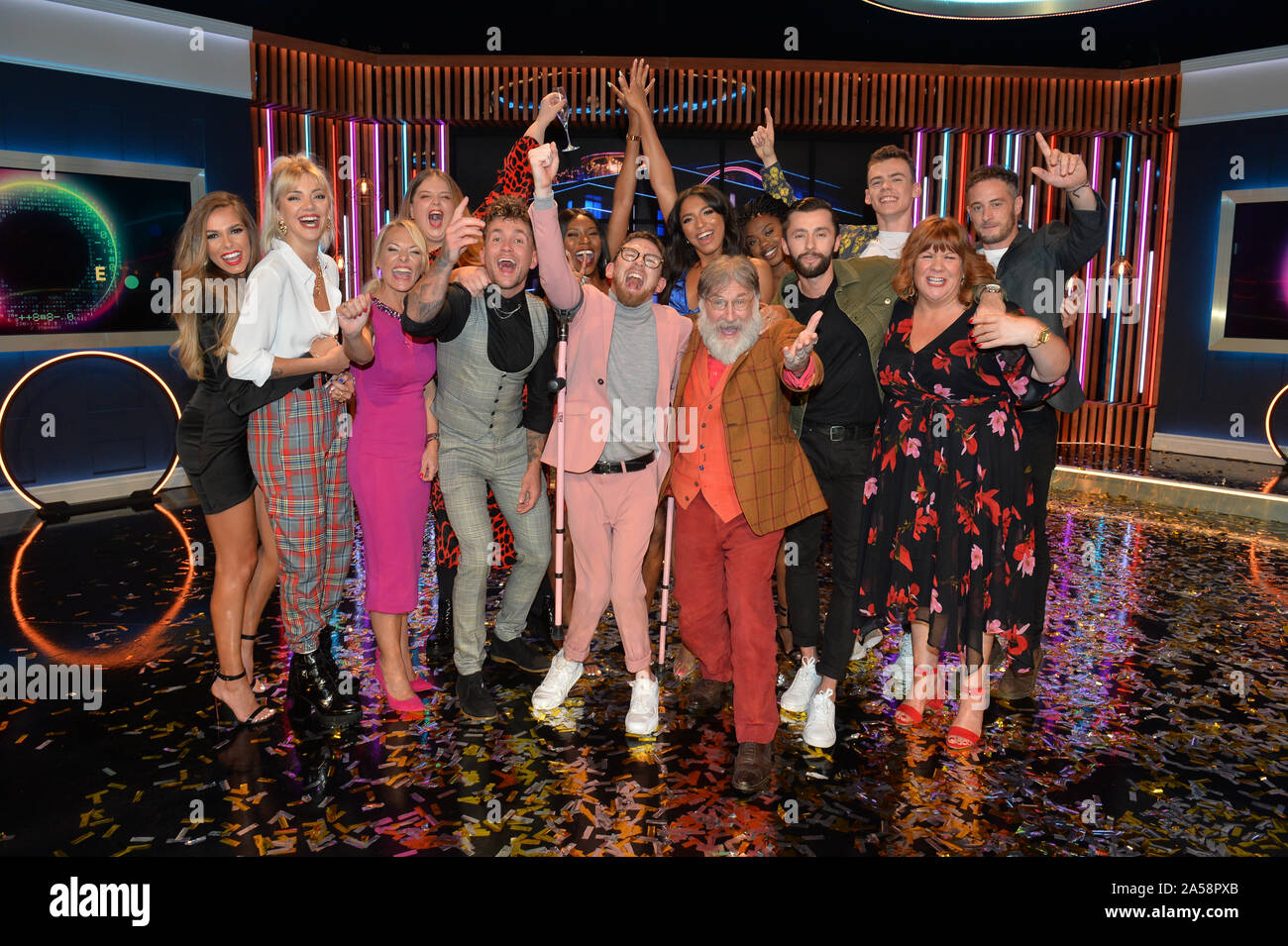 (left to right) Beth Dunlavey, Emelle Smith, Katie Roe Carr, Jack Quirk, Ella May, winner Paddy Smyth, Brooke Odunbaku, Georgina Elliott, Viewer's Champion Tim Wilson, Busayo Twins, James Doran, Woody Cook, Jan Jones and Sy Jennings celebrating after the final of the second series of Channel 4's The Circle in Salford, Manchester. Stock Photo