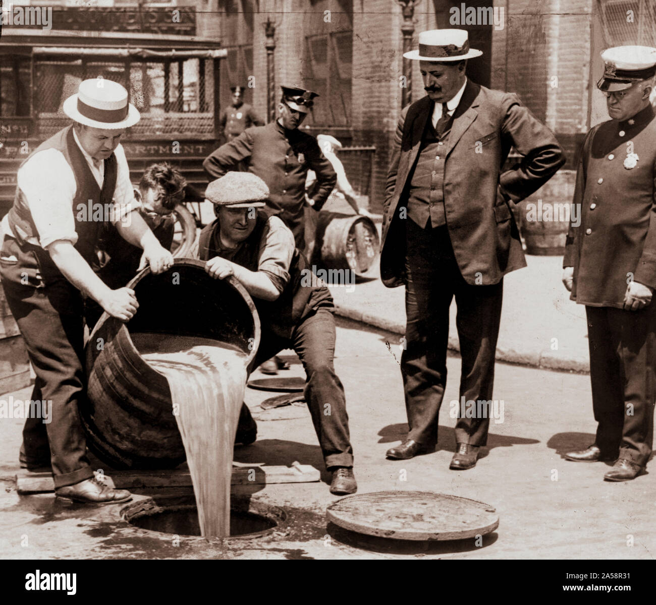 New York City Deputy Police Commissioner John A. Leach, right, watching agents pour liquor into sewer following a raid during the height of prohibition. Prohibition in the United States focused on the manufacture, transportation, and sale of alcoholic beverages; however, exceptions were made for medicinal and religious uses. Alcohol consumption was never illegal under federal law. Nationwide Prohibition did not begin in the United States until January 1920, when the Eighteenth Amendment to the U.S. Constitution went into effect. The 18th amendment was ratified in 1919. Stock Photo