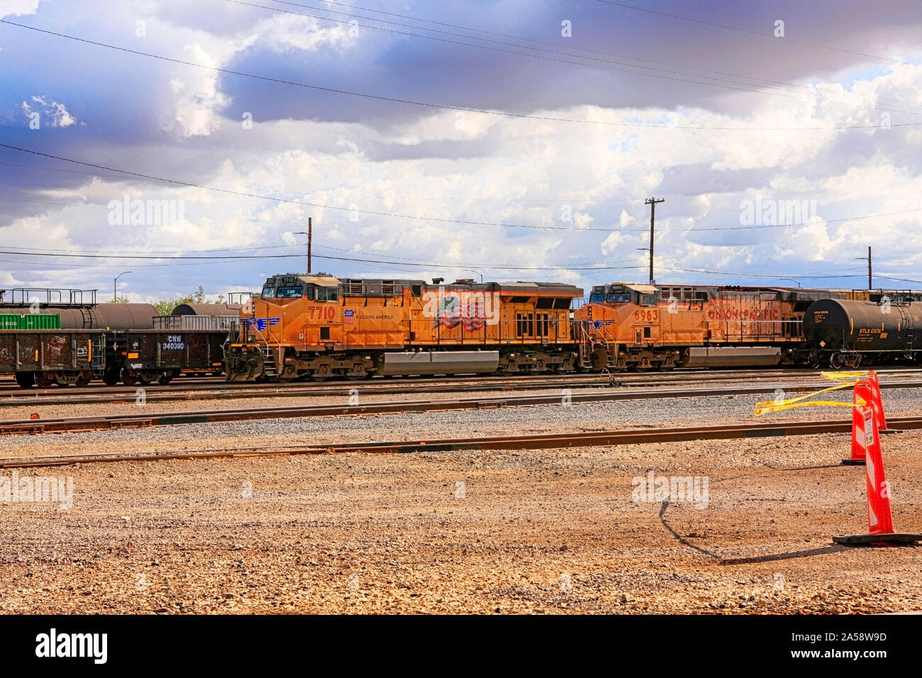 Union Pacific 7710 GE AC6000CW bright yellow in the Tucson
