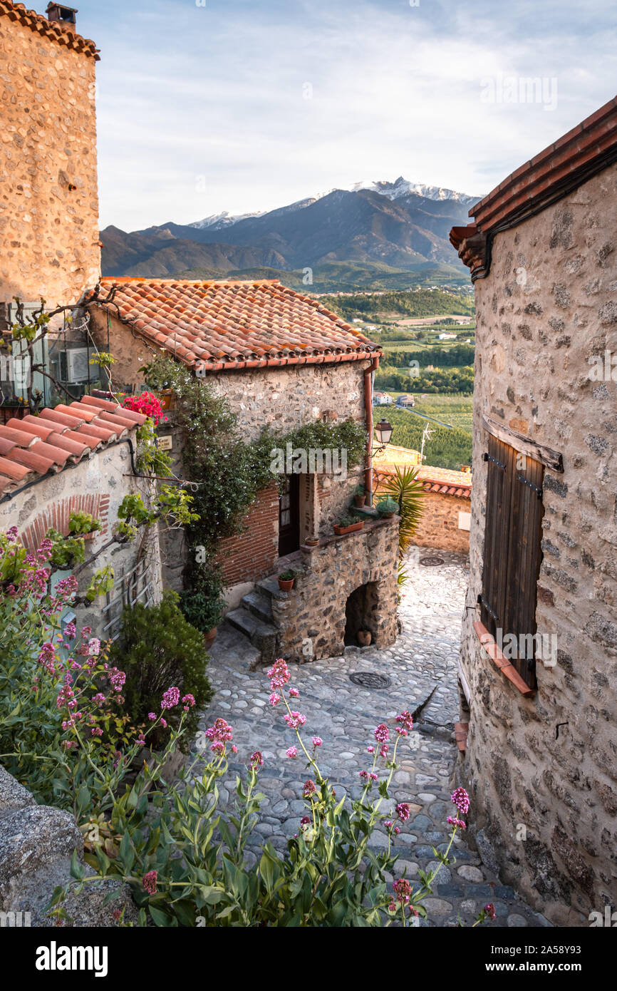 Narrow village lane in Eus, Pyrenees-Orientales, France Stock Photo