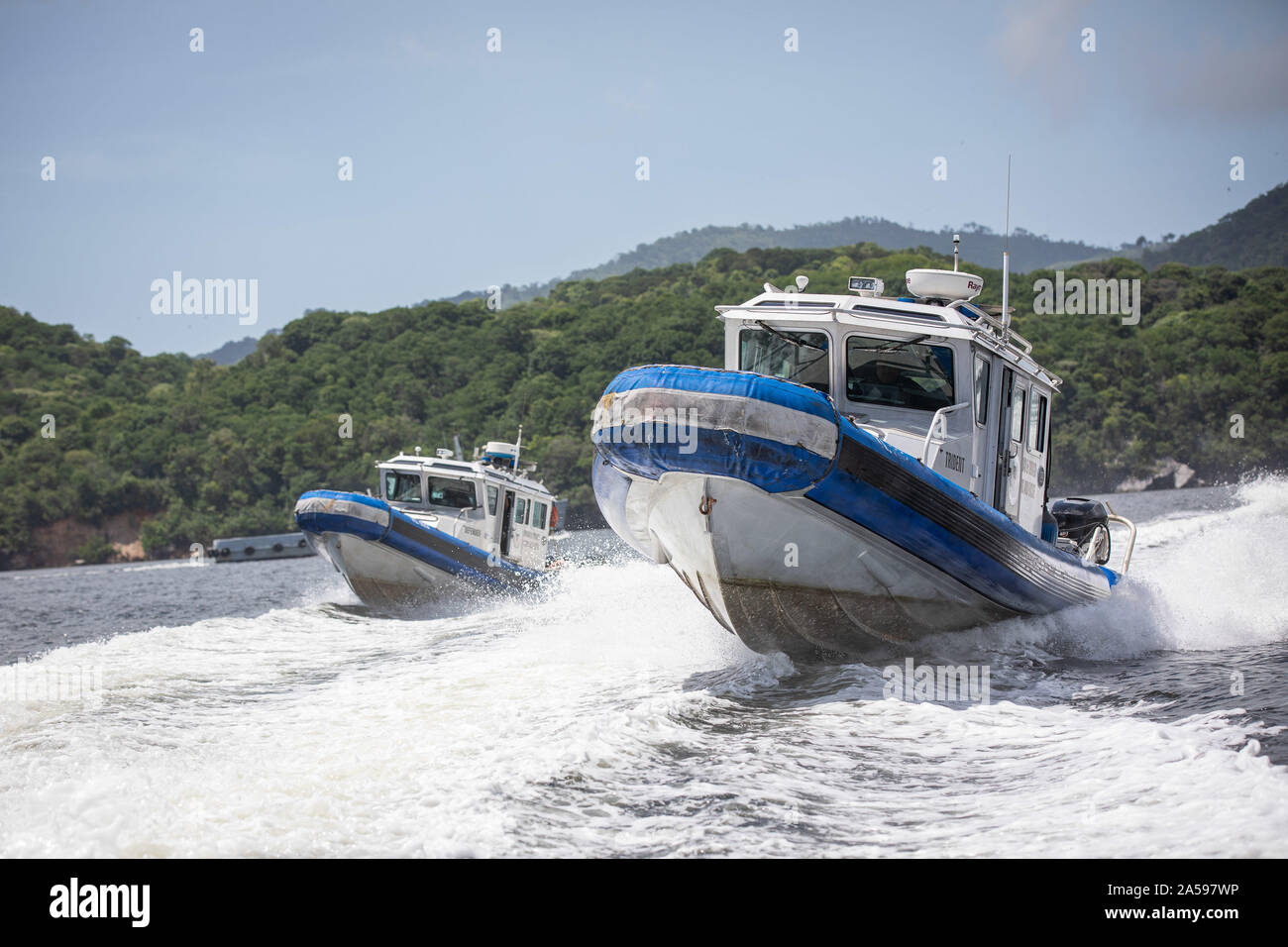 Two Trinidad and Tobago Customs and Excise SAFE boats practice vessel pursuit tactics during scenario-based training conducted by U.S. Customs and Border Protections Air and Marine Operations on Sept. 26, 2019, off the coast of Chaguaramas, Trinidad, a mere 8-mile boat ride from the country of Venezuela. A decade has passed since TTCE officers have received any formal marine training from the United States. CBP photo by Ozzy Trevino Stock Photo