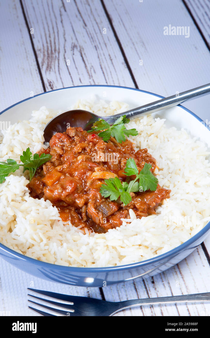 Quorn chili with rice and orzo pilaf Stock Photo