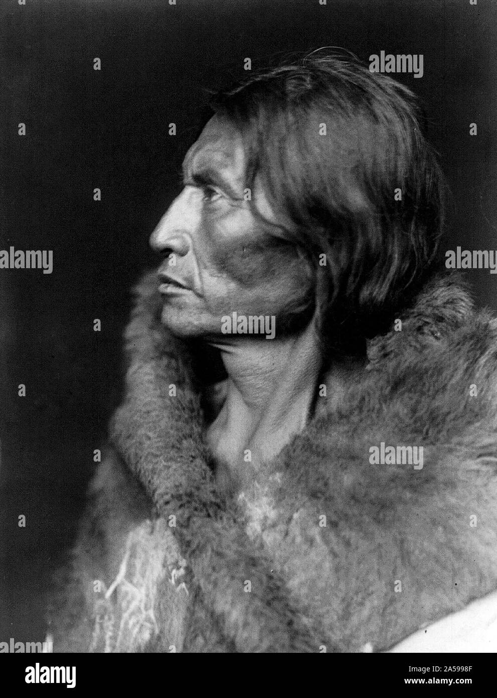 Edward S. Curtis Native American Indians - Assiniboine man, Mosquito Hawk ca. 1908 Stock Photo