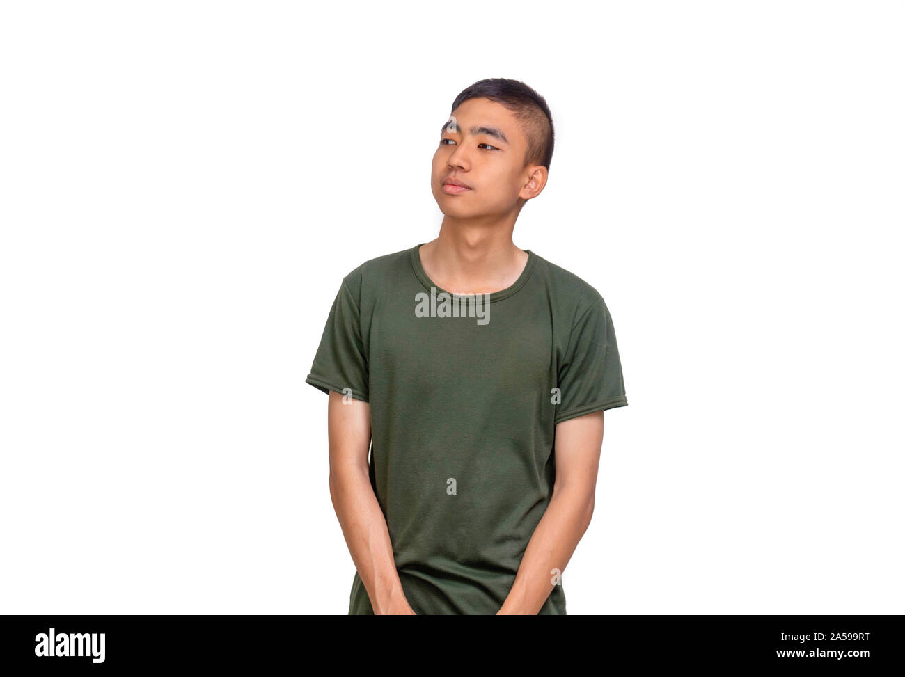 The young Thai man in shrt hair and olive green t-shirt look to his right side Stock Photo