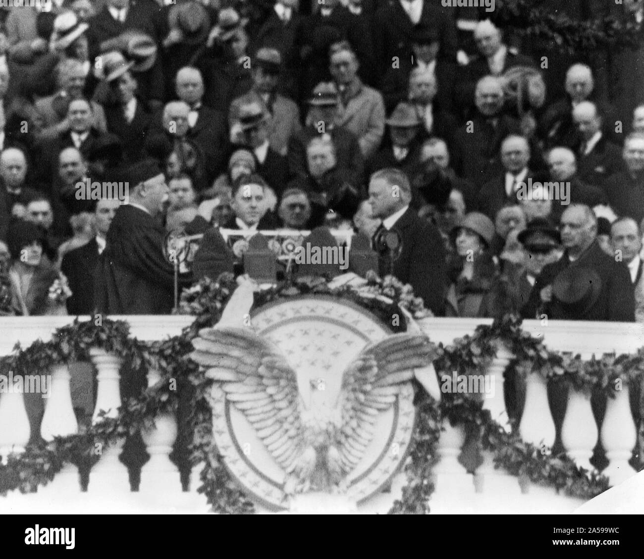Chief Justice William H. Taft administering the oath of office to Herbert Hoover on the east portico of the U.S. Capitol, March 4, 1929 Stock Photo