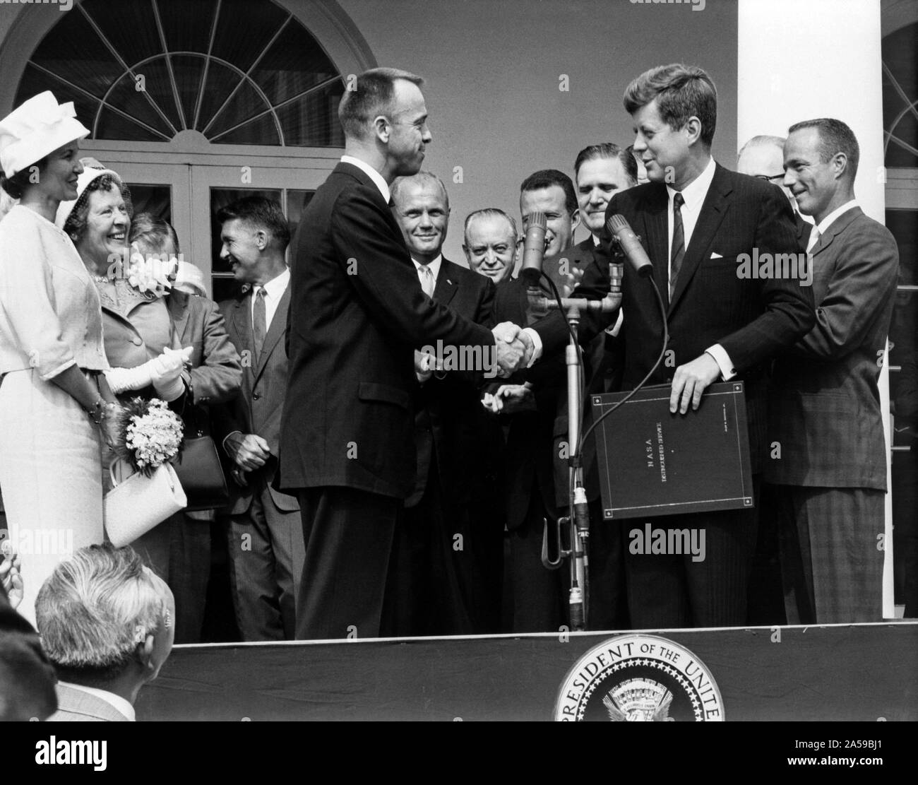 Astronaut Alan B. Shepard Jr. receives the NASA Distinguished Service Award from United States President John F. Kennedy May 8, 1961, days after his history making MR-3 flight Stock Photo