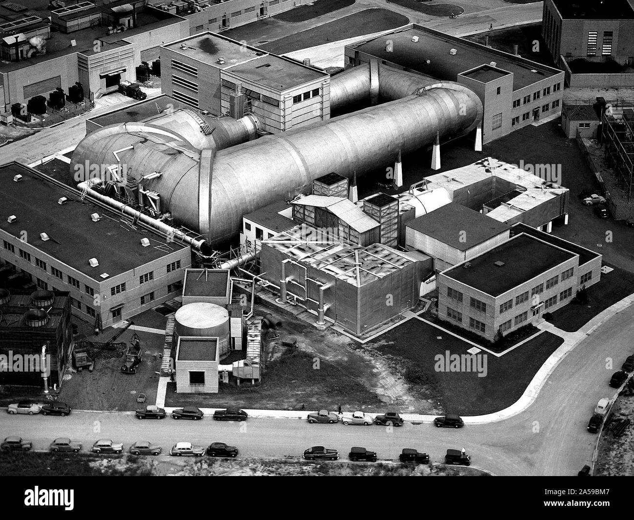 This aerial photograph shows the entire original wind tunnel complex at the National Advisory Committee for Aeronautics (NACA) Aircraft Engine Research Laboratory. September 1945 Stock Photo