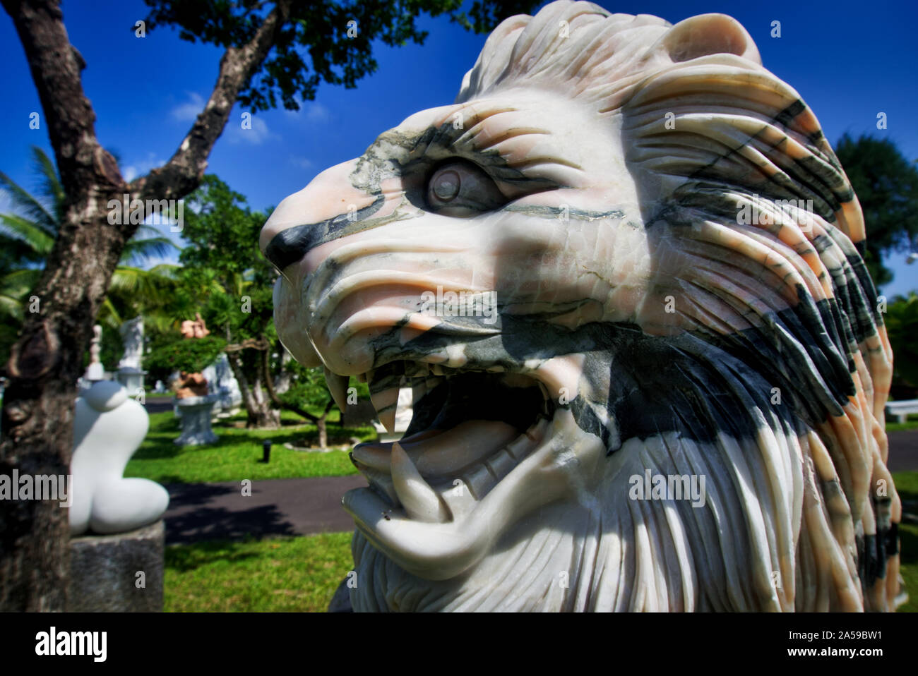 Close of marble lion's mouth. Stone and rock carvings from central Vietnam. Sculpture and skilled artisan work. Stock Photo