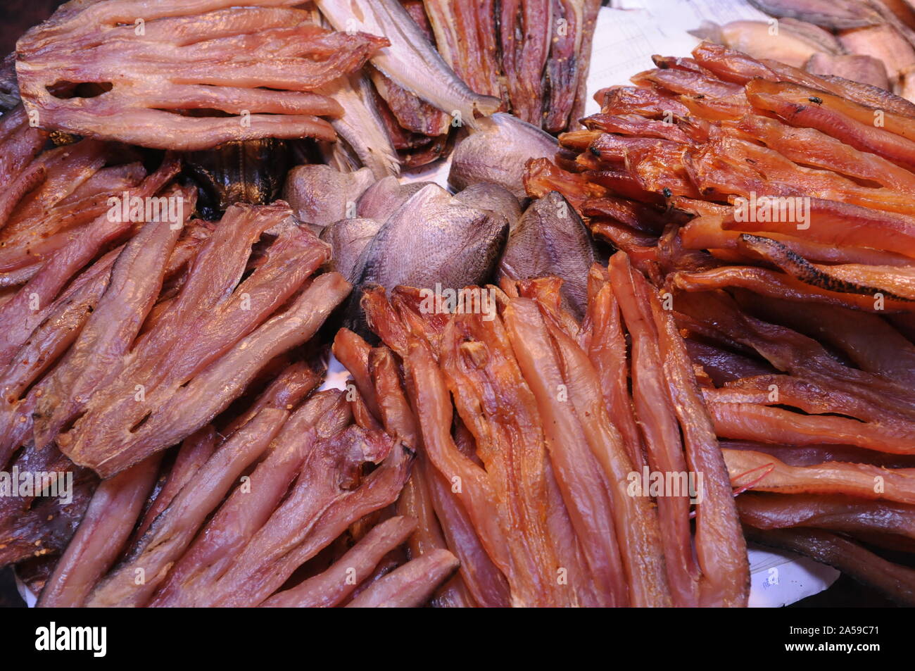 Dried fish for sale at market stall. The Russian Market, Phnom Penh