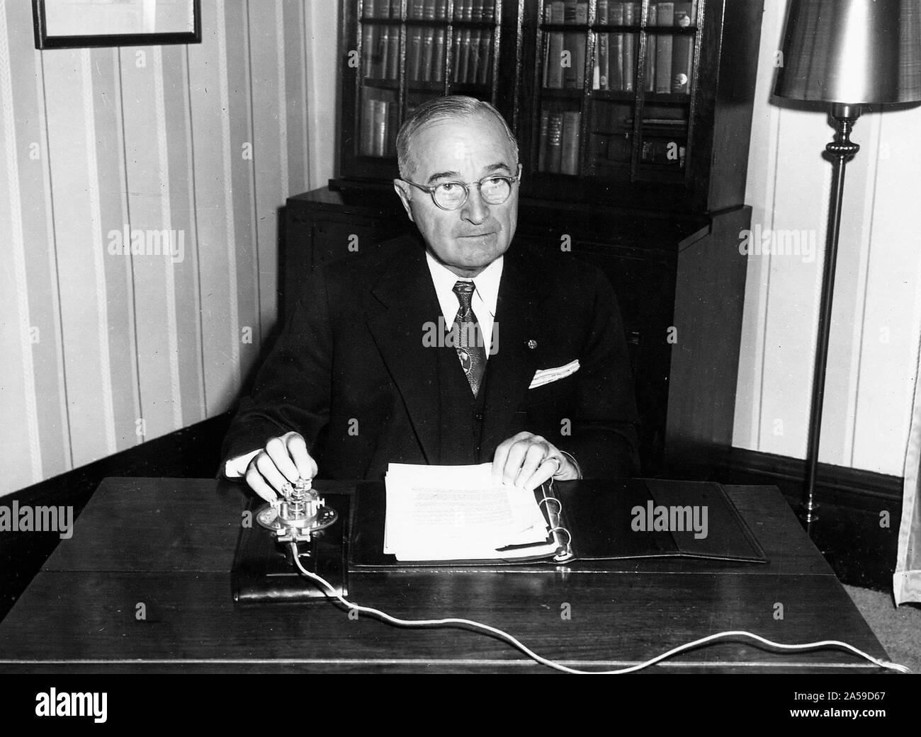 12 24 1951 President Harry S. Truman at home in Independence, Missouri, on Christmas Eve. He is preparing to give his Christmas address to the nation and remotely light the National Christmas Tree in Washington, D. C. Stock Photo