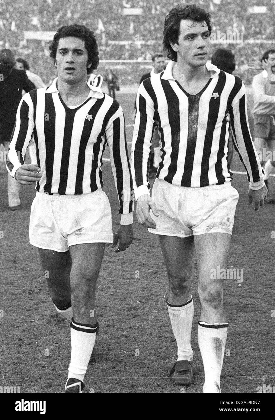 Rome, Olympic Stadium, January 5, 1975. From left: Juventus players, Claudio Gentile and Roberto Bettega, come out of the field at the end of the lost away match at Lazio (0-1) and valid for the 12th day of the Italian championship of Serie A 1974-75. Stock Photo
