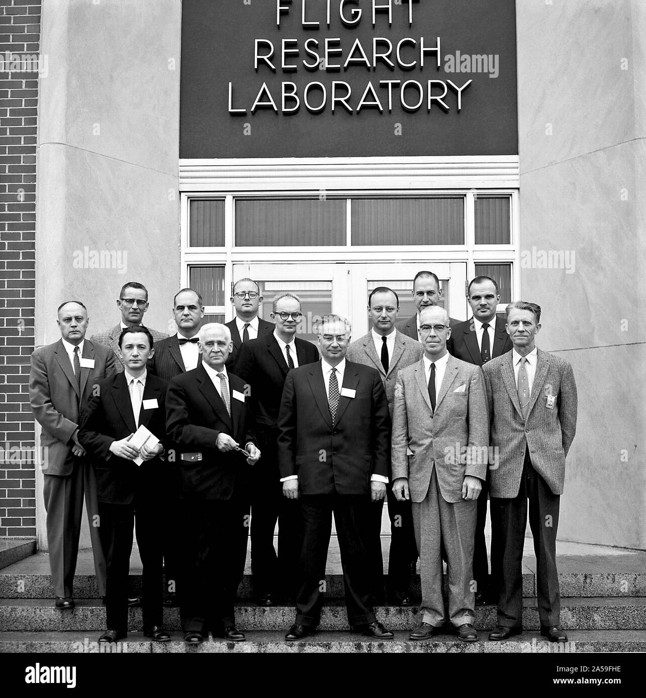 Russian Scientists from the Commission of Interplanetary Travel of the Soviet Academy of Science November 21,1959  Left to right: Front row: Yury S. Galkin, Anatoly A. Blagonravov, and Prof. Leonid I. Sedov (Chair of the Commission for Interplanetary Travel)-Soviet Academy of Science, Leninski Gory, Moscow, Russia  Dr. H.J. E. Reid and Floyd L. Thompson Langley Research Center. Second row: Boris Kit Translator, Library of Congress, Washington, D.C.  Eugene C. Draley and Laurence K. Loftin, Jr. -Langley Research Center  Arnold W. Frutkin and Harold R. Lawrence NASA Headquarters.  Back row: T.Me Stock Photo