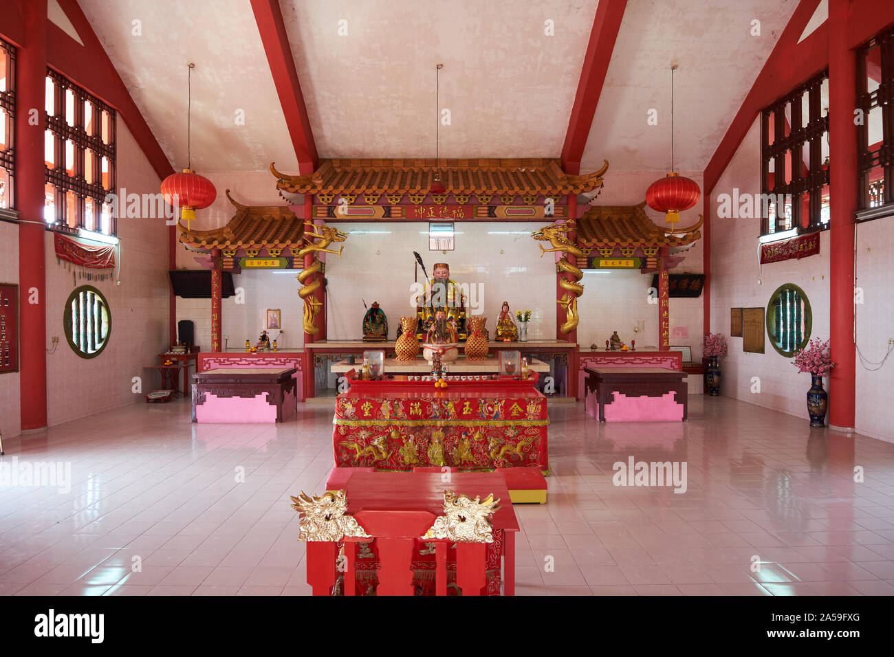 The interior altar area of the  Chinese temple, Lie Sheng Gong, in the town of Pekan. In Pahang, Malaysia. Stock Photo