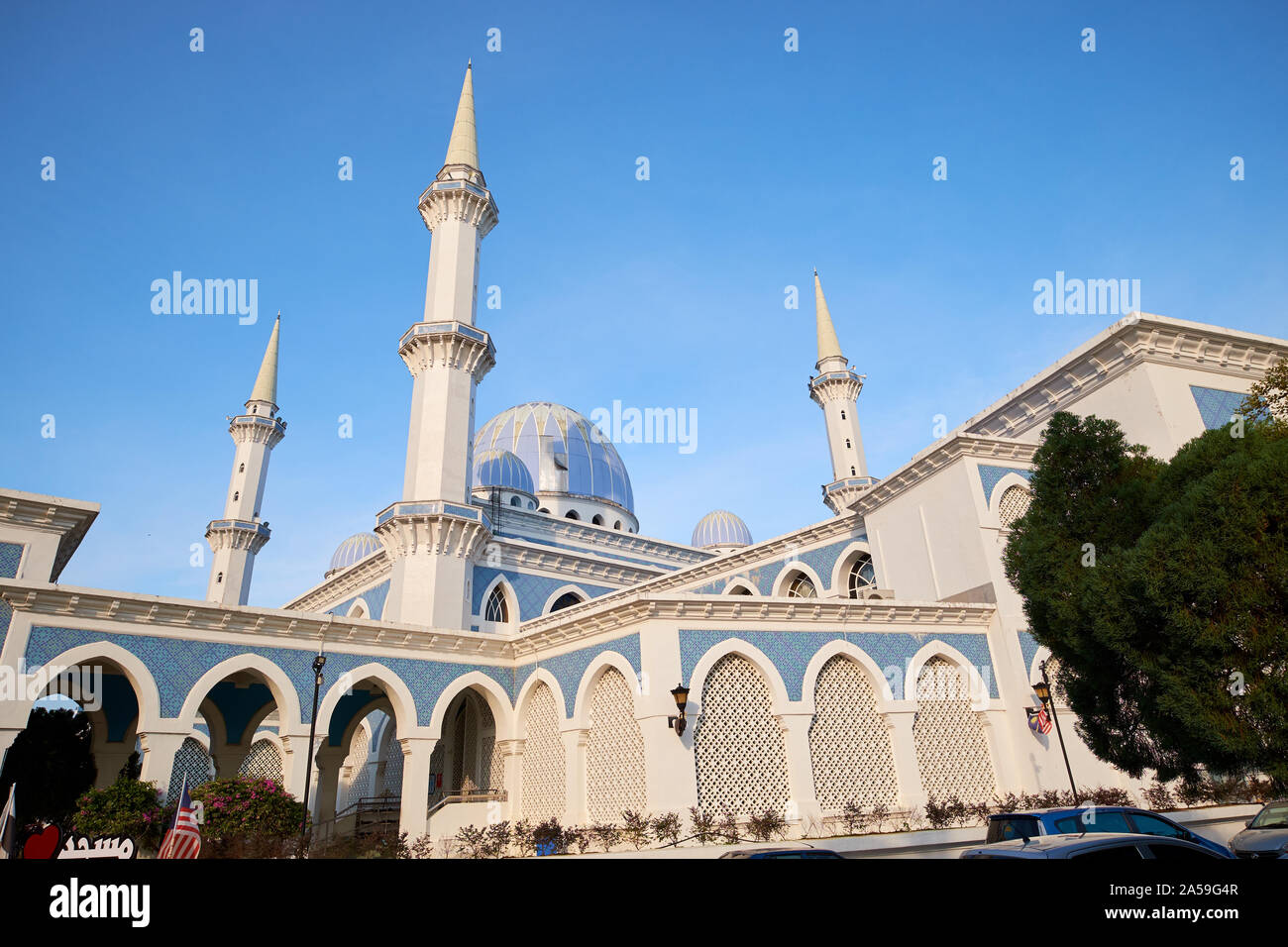 Looking up at the Kuantan city landmark blue and white  Negeri Pahang mosque. In Pahang, Malaysia. Stock Photo