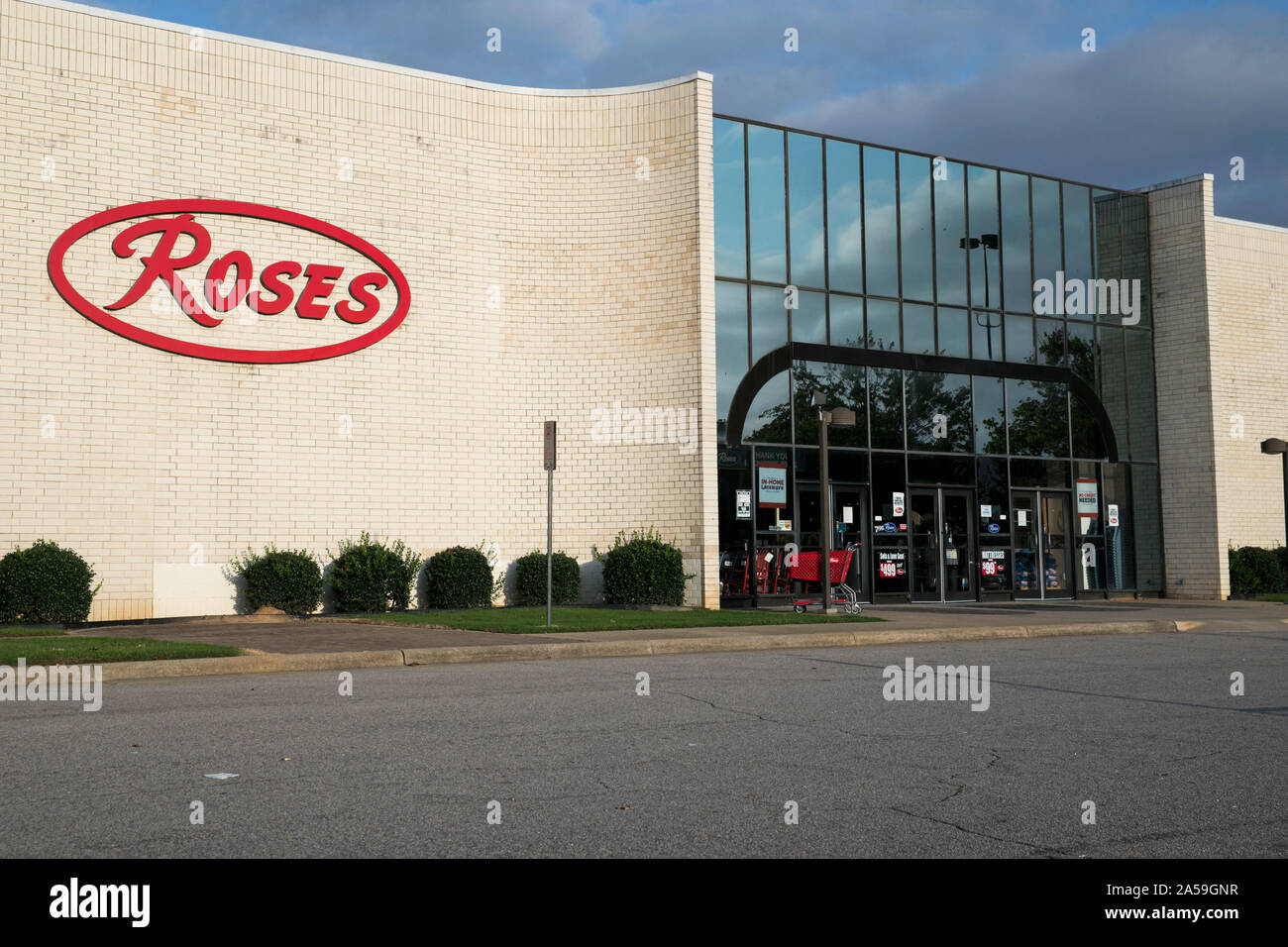 A logo sign outside of a Roses retail store location in Wilson, North