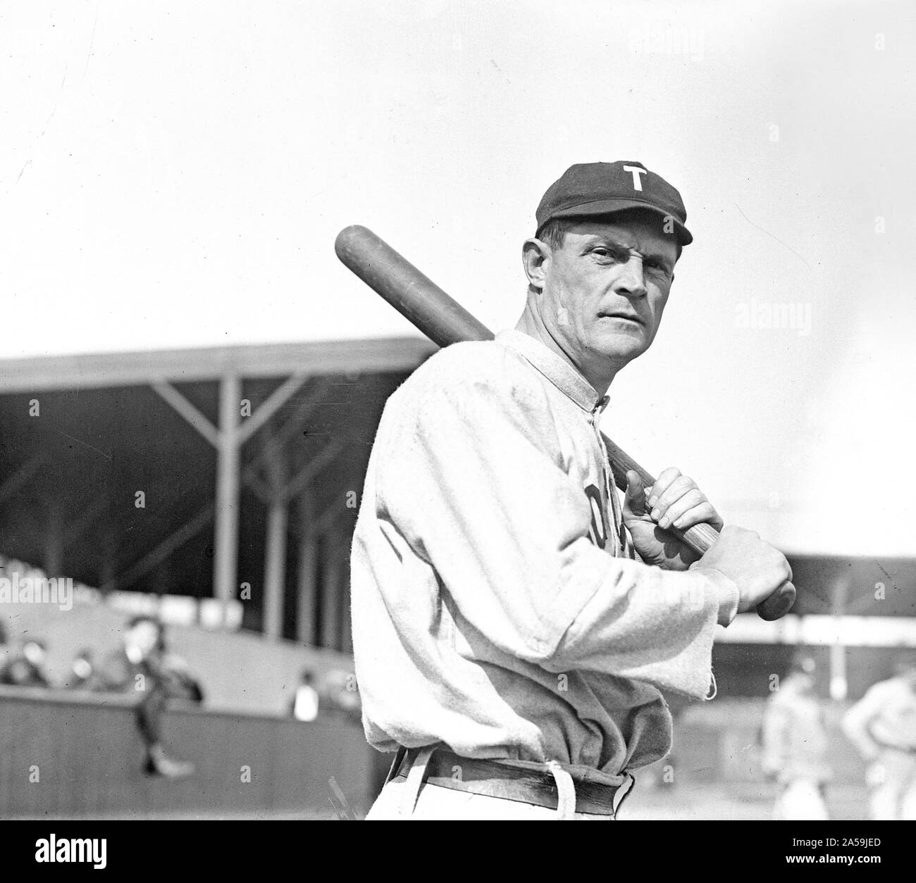 Vintage Toronto Maple Leafs baseball player holding a bat ca. 1910s Stock Photo