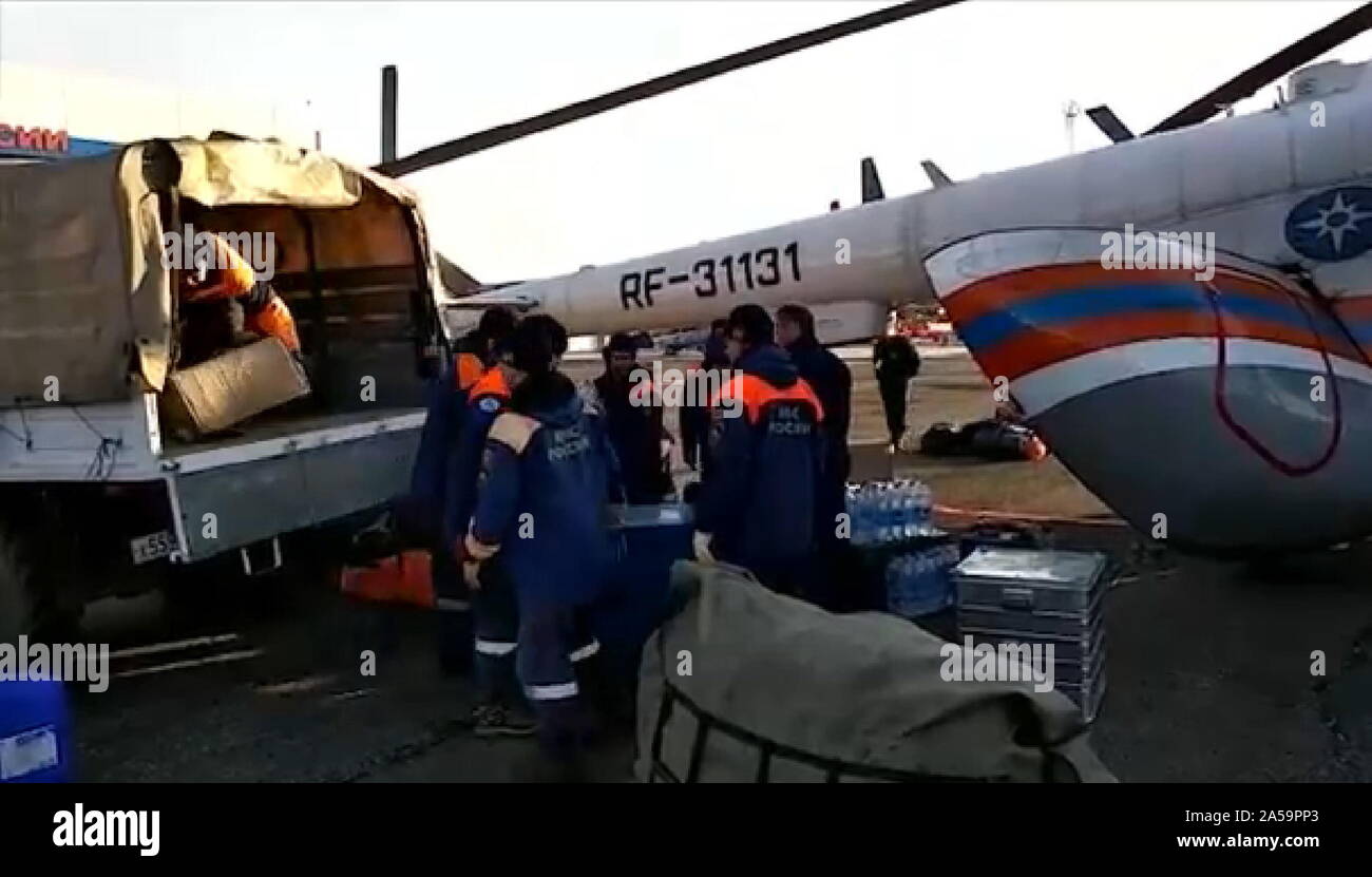 St. Petersburg. 19th Oct, 2019. Video screenshot shows staff members of the Russian Emergencies Ministry heading for a collapsed dam in the Kuraginsky district of Russia's Krasnoyarsk region, Oct. 19, 2019. At least six people were killed and 14 others injured after a dam collapsed in the Kuraginsky district of Russia's Krasnoyarsk region on Saturday, local media reported. Credit: Xinhua/Alamy Live News Stock Photo