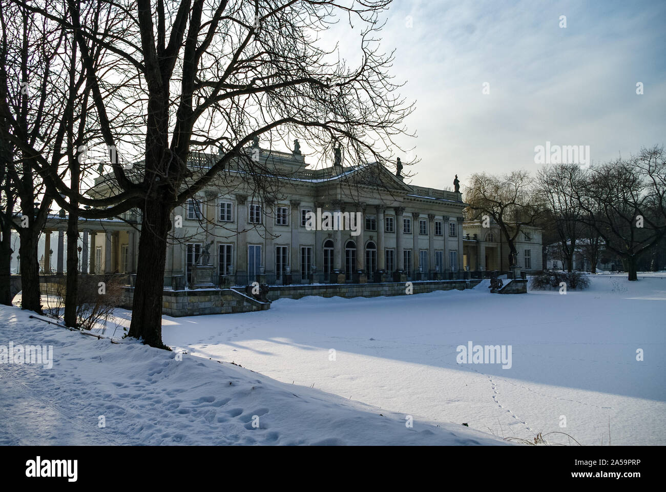 The Lazienki palace in Lazienki Park. Winter landscape with snow. Warsaw. Lazienki Krolewskie, Poland Stock Photo