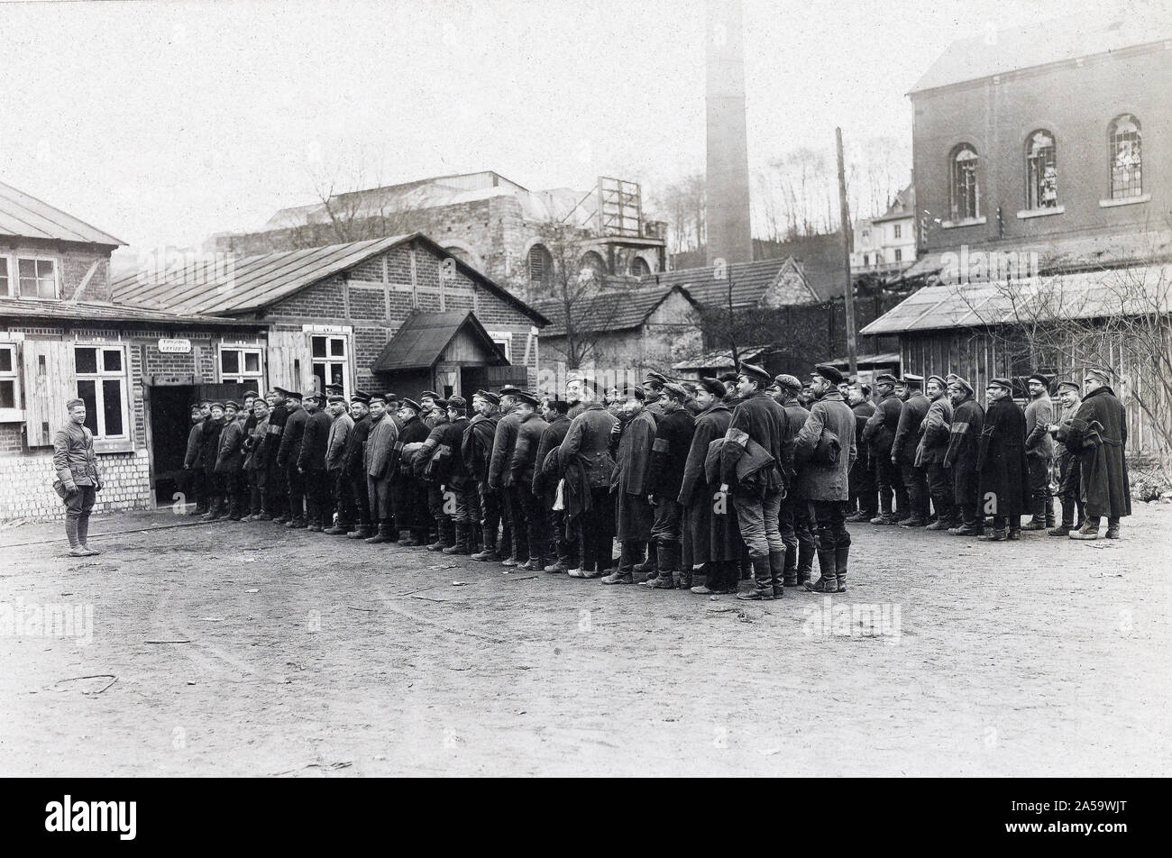 Former Russian prisoners of war about to be deloused in a place once built and used by Germans. Logway, Meurthe et Mosselle, France ca. 12/3/1918 Stock Photo