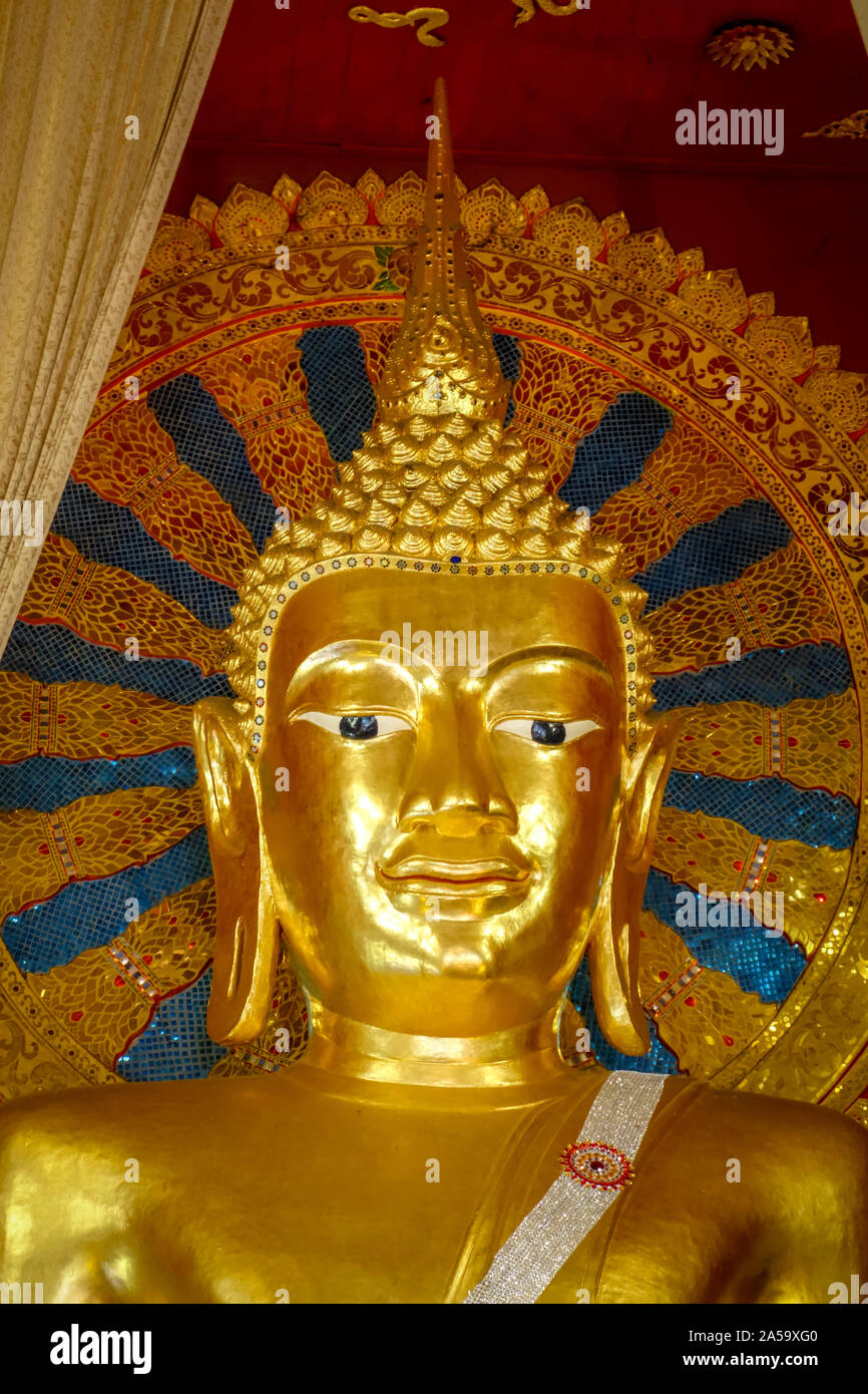 Gold buddha statue in wat phra singh temple hi-res stock photography ...
